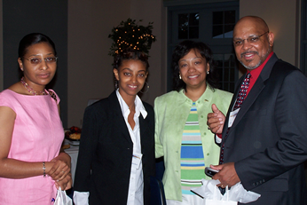 Second-year dental student (second left) flanked by several dentists in attendance